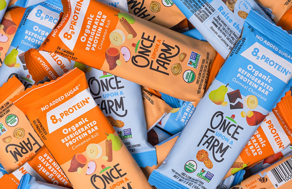 pile of Once Upon a Farm Refrigerated Protein Bars