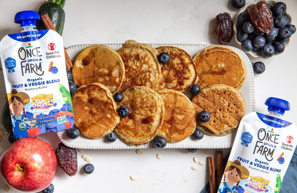 platter of mini pancakes and Once Upon a Farm Blueberry Buckle pouches