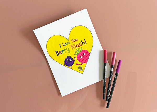 Completed coloring sheet of a heart with two berries, featuring the words, 