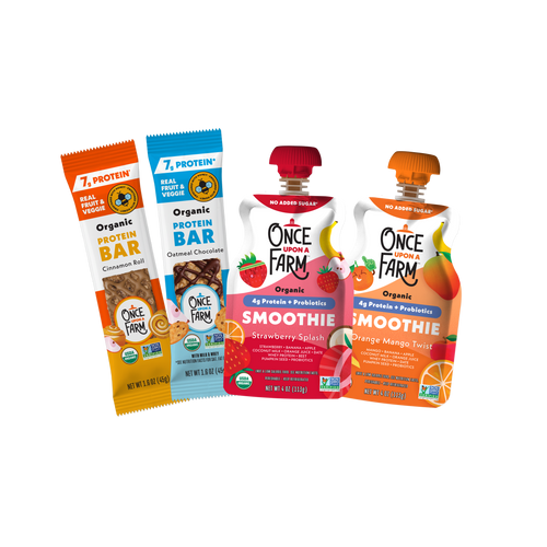 Four Once Farm baby food products displayed together on a plain white background: two protein bars in orange and blue wrappers, and two smoothies in red and orange pouches. 